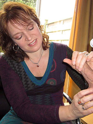 UK clothed mature handjob