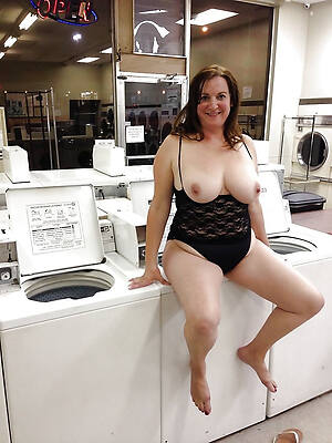 mature housewife doing laundry