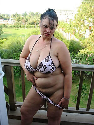 bbw mature strips off her bikini